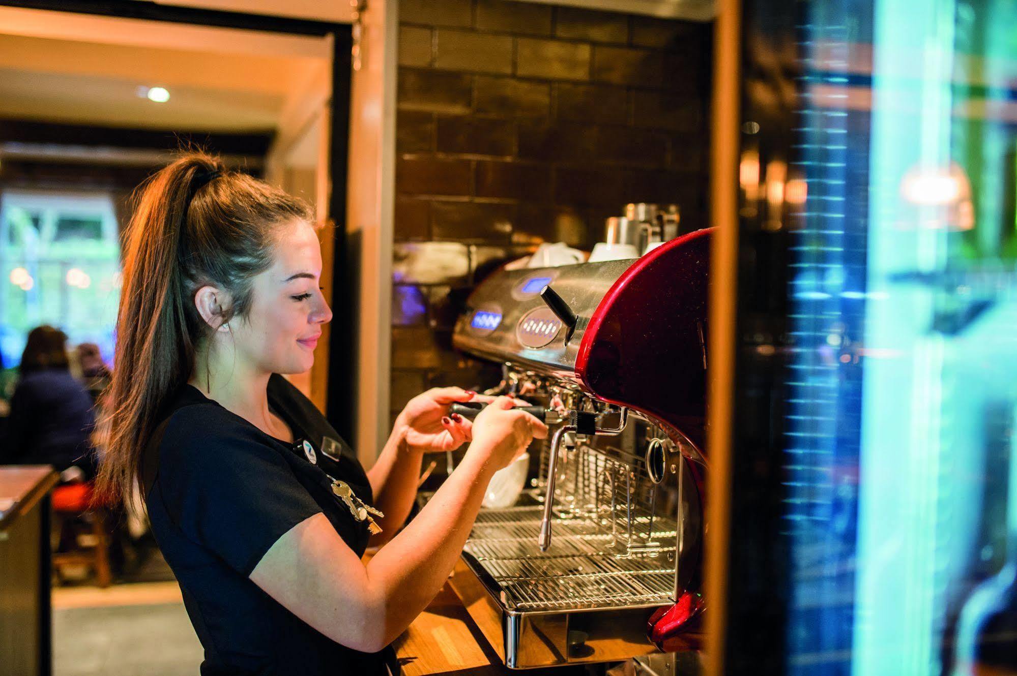 Hotel The Millstone, Mellor Blackburn  Esterno foto A barista making coffee